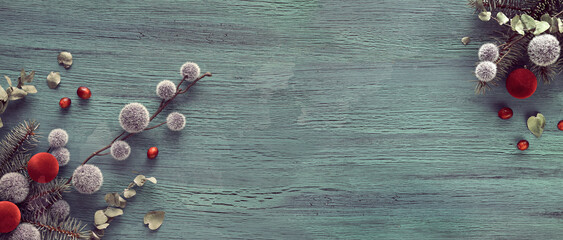 Fluffy Christmas decorations. Fuzzy soft balls. Winter panoramic banner. Cranberry, evergreen...