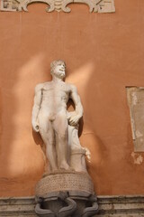 Statue of Saturn, a god in ancient Roman religion, on a fountain in Trapani, Sicily