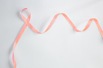 Peace ribbon on white background with copy space  for text and an Endometrial or uterine campaign.