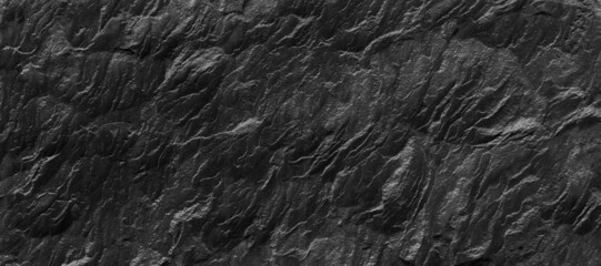 Abstract texture of the stone wall. Close-up. Light gray rock backdrop.