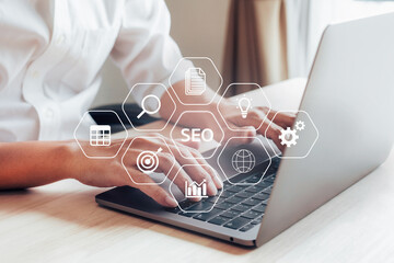 Closeup businessman working with laptop, SEO search engine optimization concept diagram with icon.