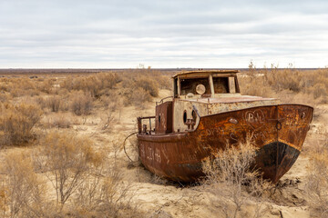 Fototapeta na wymiar Aral sea monument. The graveyard of ships. Muynak (or Moynaq) city, Karakalpakstan, Uzbekistan.