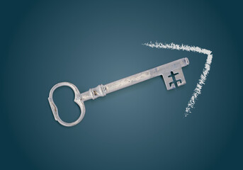 Key to success with chalk arrow on blackboard