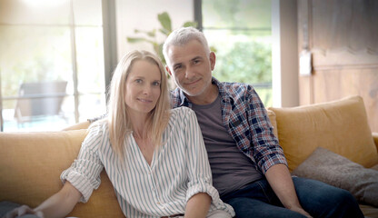 portrait of a 40-year-old couple in their home