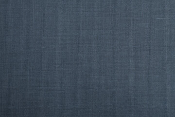 Grey fabric background with interlacing threads. Copy Space