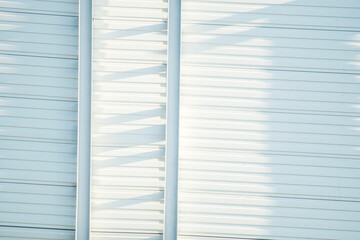 Obraz premium Geometric background with a building structure with elements creating straight lines. Abstract substrate on the theme of architecture and construction.