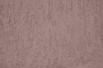 Decorative plaster vertical bark beetle. Texture of facade decorative plaster on a silicone basis with bark beetle effect, close up.