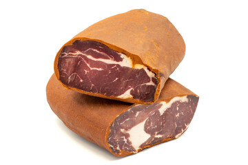 Turkish pastrami on a white background. Bacon made from veal. Turkish bacon, pastrami (Kayseri pastirma). Horizontal view. close up