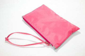 Pink bag with zipper and white background
