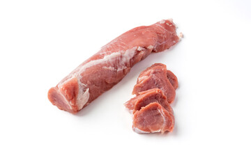Raw pork tenderloin meat on a white background