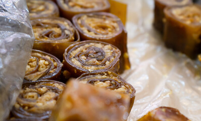 nuts with caramel in sweet pastille, chopped and spread