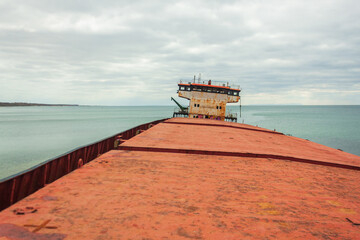 View from the ship's side of the captain's cabin. A dry cargo ship abandoned after a shipwreck.