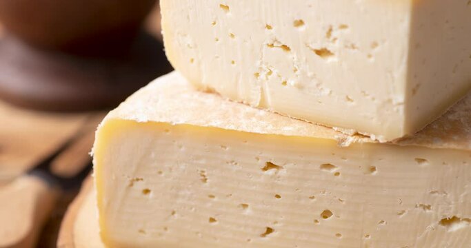 Artisanal Canastra cheese from Minas Gerais, Brazil over wooden board