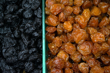 Dried fruits fresh prunes and persimmons