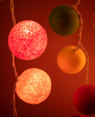 Illuminated Christmas decoration in warm colors at Christmas market