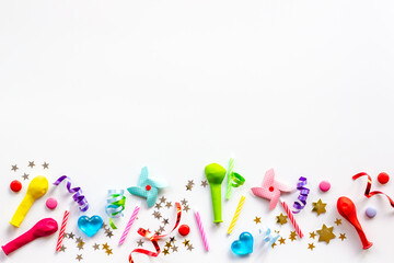 Children kids party flat lay confetti with party hats and balloons