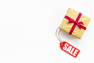 Sale label tag with gift box. Discount shopping day concept