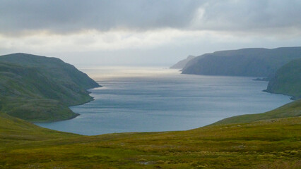 Fjord in the haze and evening light, Norway