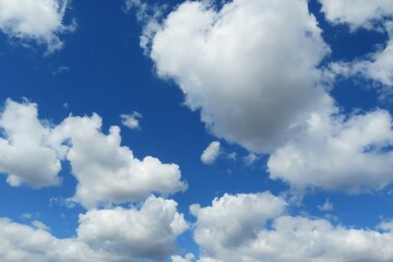 Naklejka na ściany i meble Beautiful heart shape clouds in blue sky, natural clouds background