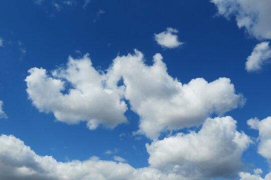 Beautiful heart shape clouds in blue sky, natural clouds background