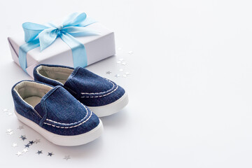 Baby shower party set with baby booties and gift box