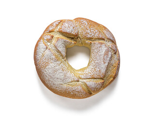Top view of the roll - white bread in the shape of a ring