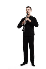 Clarinet player classical musician isolated on white. Clarinetist