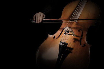 Cello player. Cellist hands playing cello closeup. Violoncello