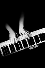 Piano player hands pianist playing keyboard