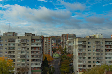 USSR architecture living district concrete panel poor and grunge buildings and street foreshortening above