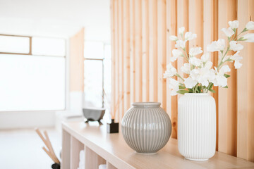 White flower vase on table in pilates studio