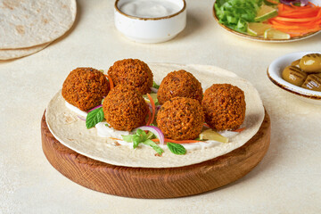Chickpeas falafel prepare to make wrap sandwich. Closeup