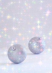 Silver color Christmas ornaments and sparkling lights effect