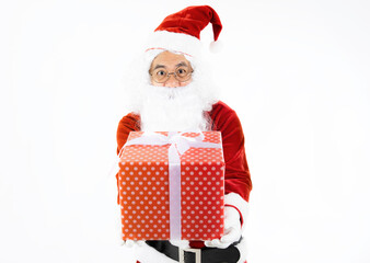 Christmas gift and happy New Year- Santa claus giving gift box. Santa claus with giftbox of presents on white background.