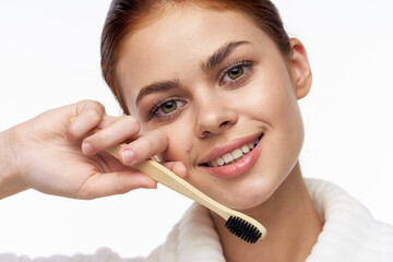 Woman in white coat toothbrush oral hygiene