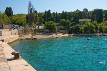 The small port of Glavotok pier during late summer, Krk Island in Primorje-Gorski Kotar County, western Croatia