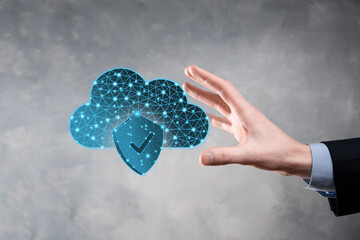 Cloud technology. Polygonal wireframe cloud storage sign with shield with a tick on dark blue....