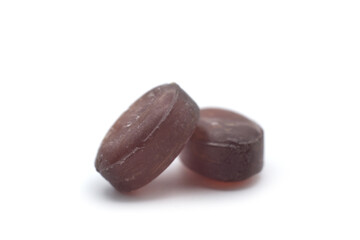 Closeup of mint and eucalyptus candies on white background