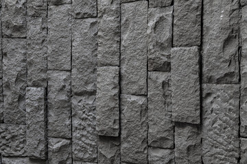 The blocks of solid stone, The wall of gray stone, Vintage rustic weathered uneven background
