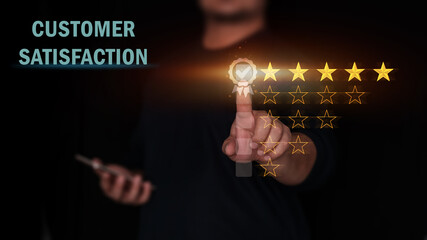 customer satisfaction survey concept, Customer hand touching to 5 stars virtual screening monitor for review. (good) for give score point to review the service business.feedback rating and positive.  