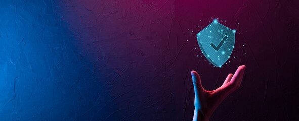 Businessman hold low poly polygon shield with a tick icon.Secure Access System Concept.Business Financial Warranty for Investment.antivirus concept.Technology security.Protection network,safe data.