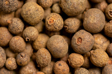 Allspice spice background. Natural seasoning texture