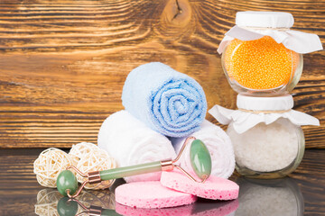 set of spa treatments and relaxing baths on wooden background