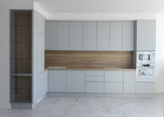 Minimalist kitchen and use of wood