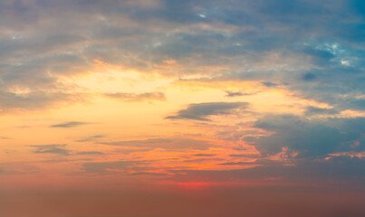 Naklejka na ściany i meble Majestic real sunrise sundown sky background with dramatic colorful clouds