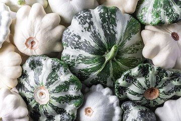 Fresh vegetables of color pattypan squash pumpkins top view. Autumn composition. Vegetables for a...