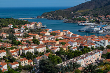 Fototapeta na wymiar Aerial view of Port Vendres town with its church and trawler at dock, Mediterranean sea, Roussillon, Pyrenees Orientales, Vermilion coast, France