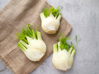 Top view of three fresh fennel bulb. Delicious and healthy food ingredients.