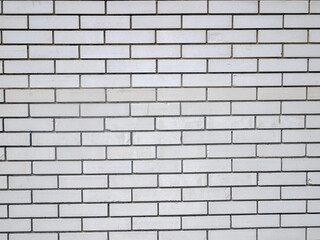 White brick wall. Shabby empty surface. Neutral background.