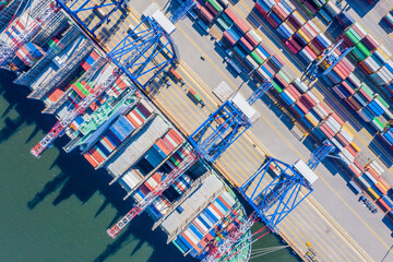 Container ship loading at port with crane, container ship carryi - obrazy, fototapety, plakaty